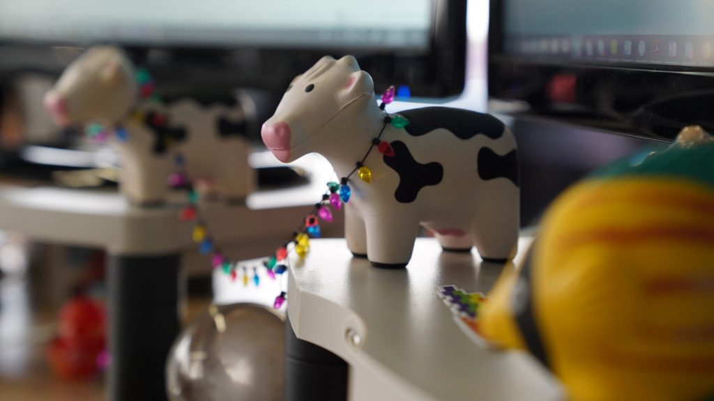 Festive cows on monitor stands